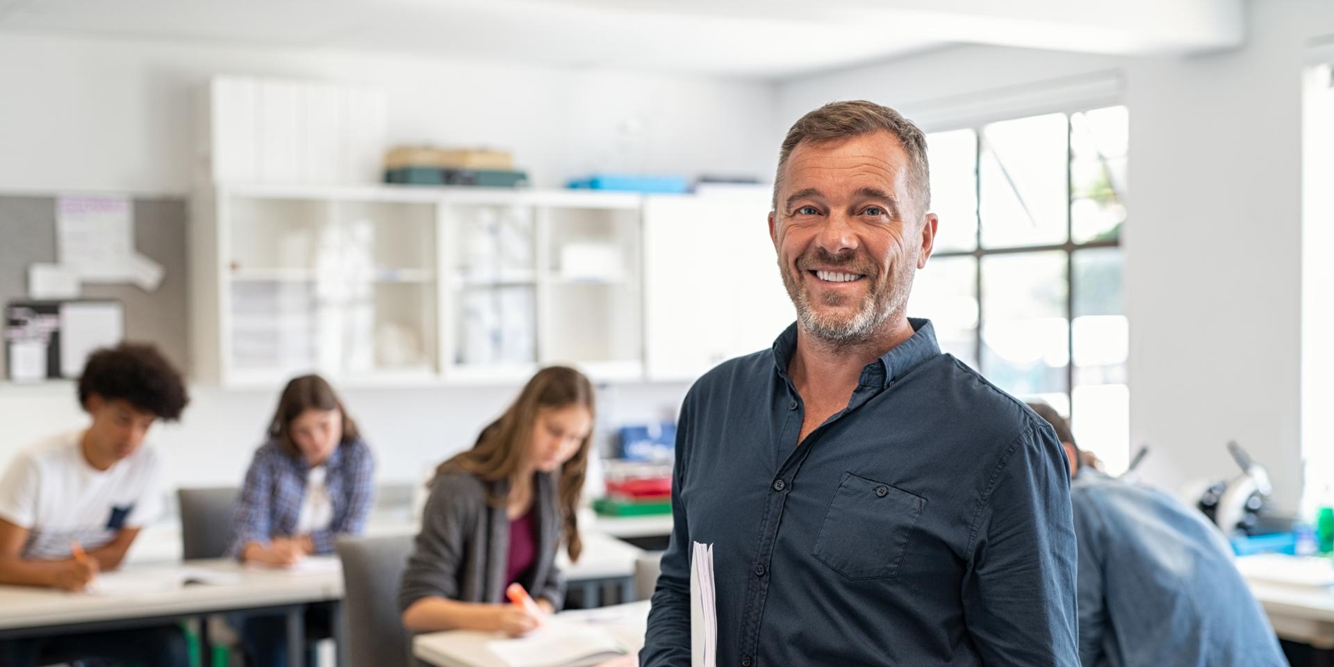 Secondary school teacher in classroom